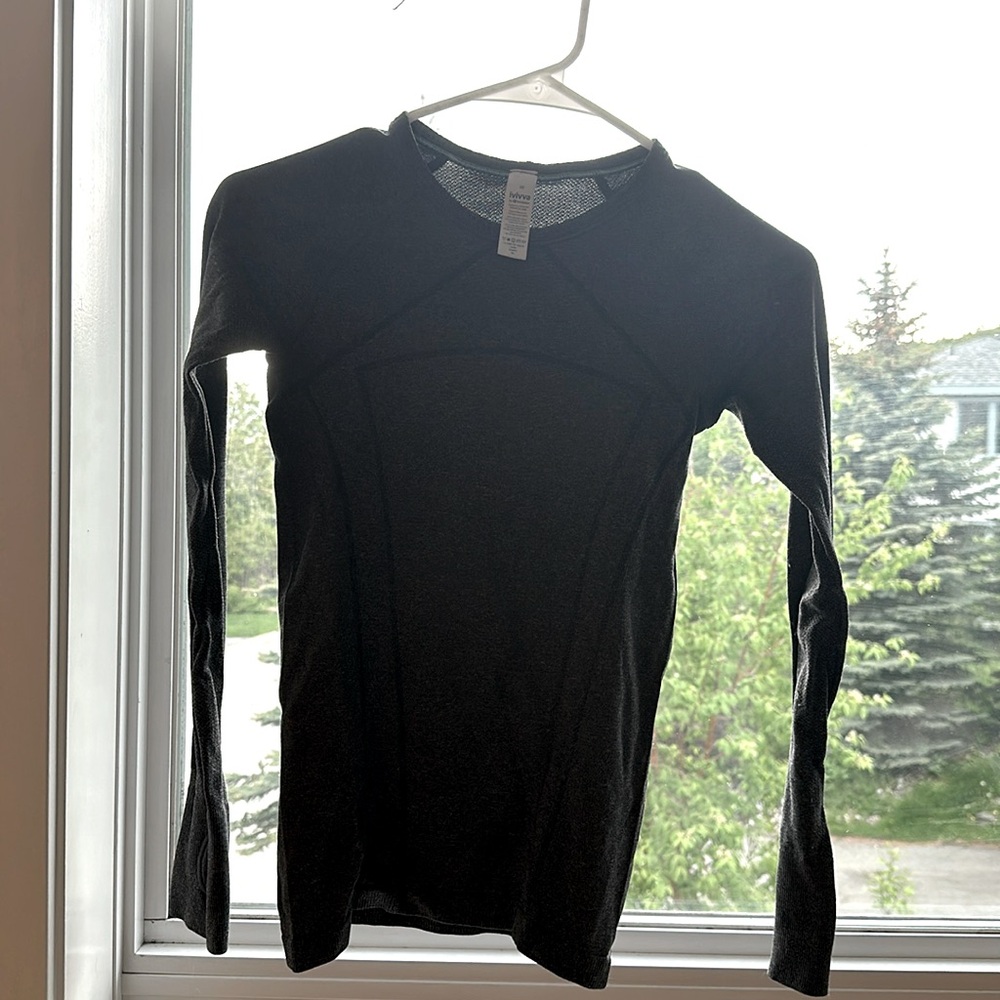 I am selling this because it has one tiny whole in the sleeve.